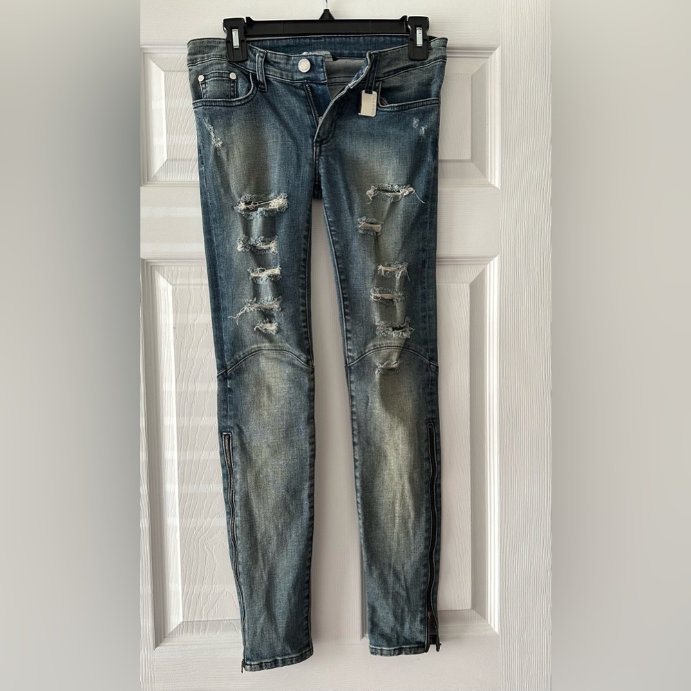Thomas Wylde Skinny Destroyed Jeans are a size 25.